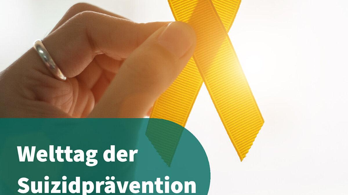Gelbe Schleife in der Hand. © Zentralinstitut für Seelische Gesundheit